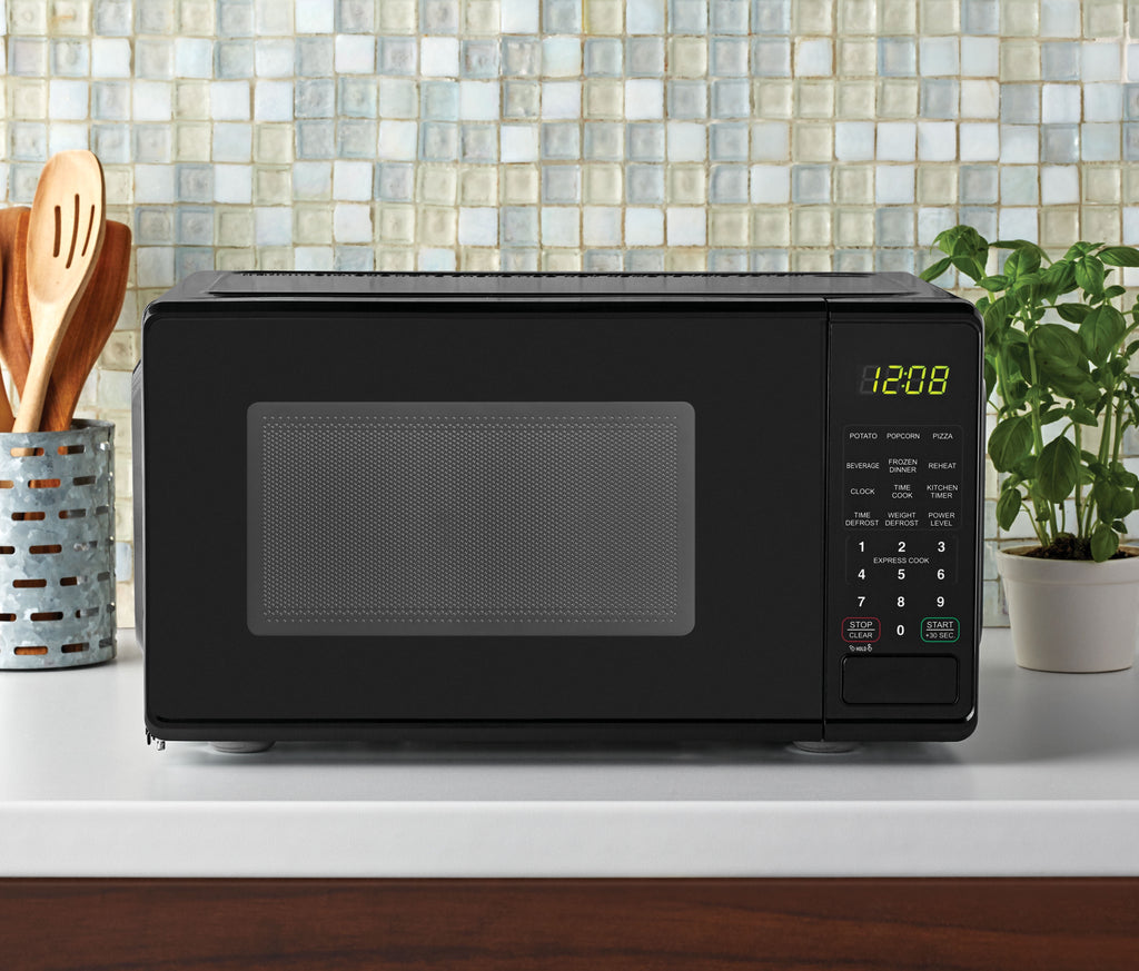 Mainstays 0.7 cu. ft. Countertop Microwave Oven, 700 Watts, White, New