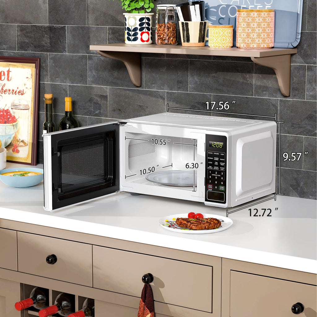 Mainstays 0.7 Cu ft Countertop Microwave Oven, 700 Watts, Black, New