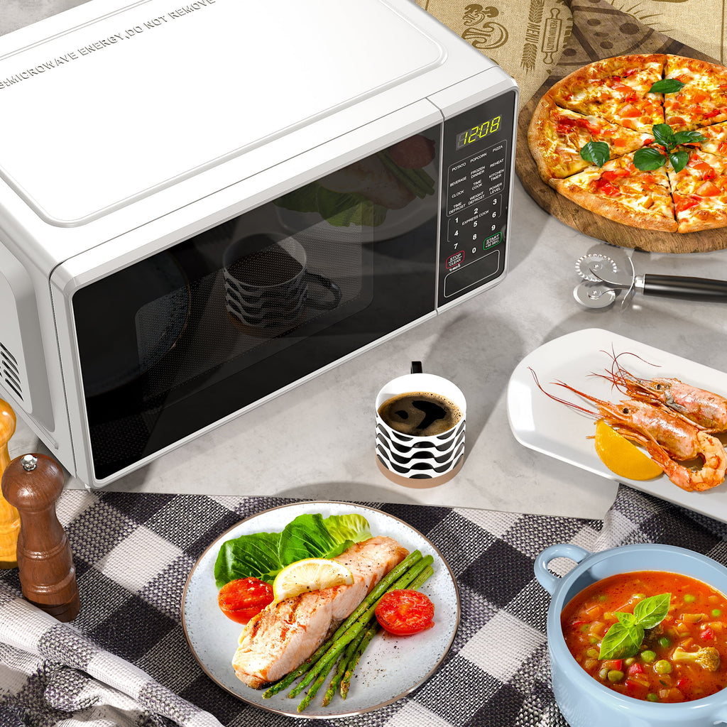 Mainstays 0.7 Cu ft Countertop Microwave Oven, 700 Watts, Black, New